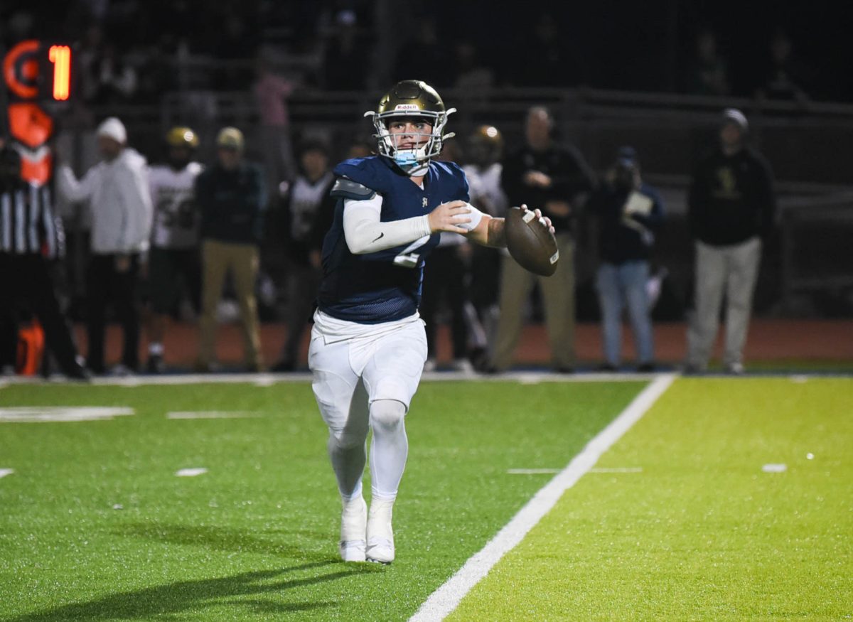 Quarterback+Timmy+Herr+is+in+his+throwing+motion%2C+targeting+a+receiver+to+his+left+in+a+CIF-Semi+Final+game.+This+season+was+Herr%E2%80%99s+first+at+SJHHS.+The+lefty+quarterback+liked+the+welcoming+environment+at+San+Juan+Hills.+%E2%80%9CA+good+thing+that+stood+out+is+%5Bthat%5D+right+when+I+got+here%2C+everyone+treated+me+as+family.+I+just+got+welcomed+in+by+the+coaches+and+the+players+right+away.+It+was+easy+to+build+a+bond+with+the+team+and+the+coaches%2C%E2%80%9D+said+Herr.+