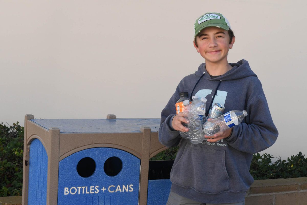 Rounding up plastic bottles, Ryan Hickman stays after school to clean up the campus of SJH. He owns his self-made business: Ryan’s Recycling Company to which he brings these mass collections.
