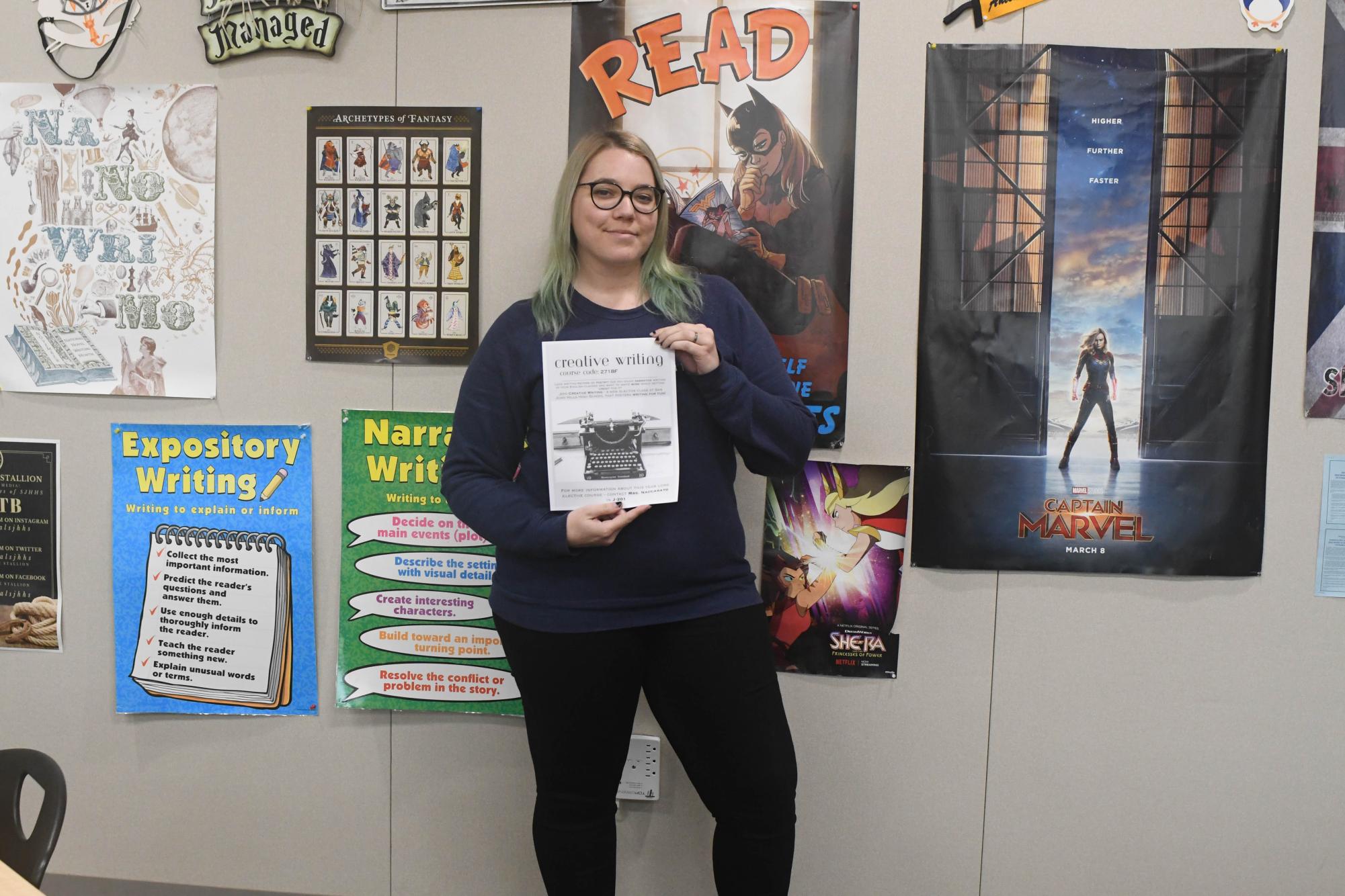 Caitlyn Naccarato advertises her flier for the new Creative Writing elective class offered next year at San Juan Hills High School. Naccarato is taking sign ups for next years class in room J201.
