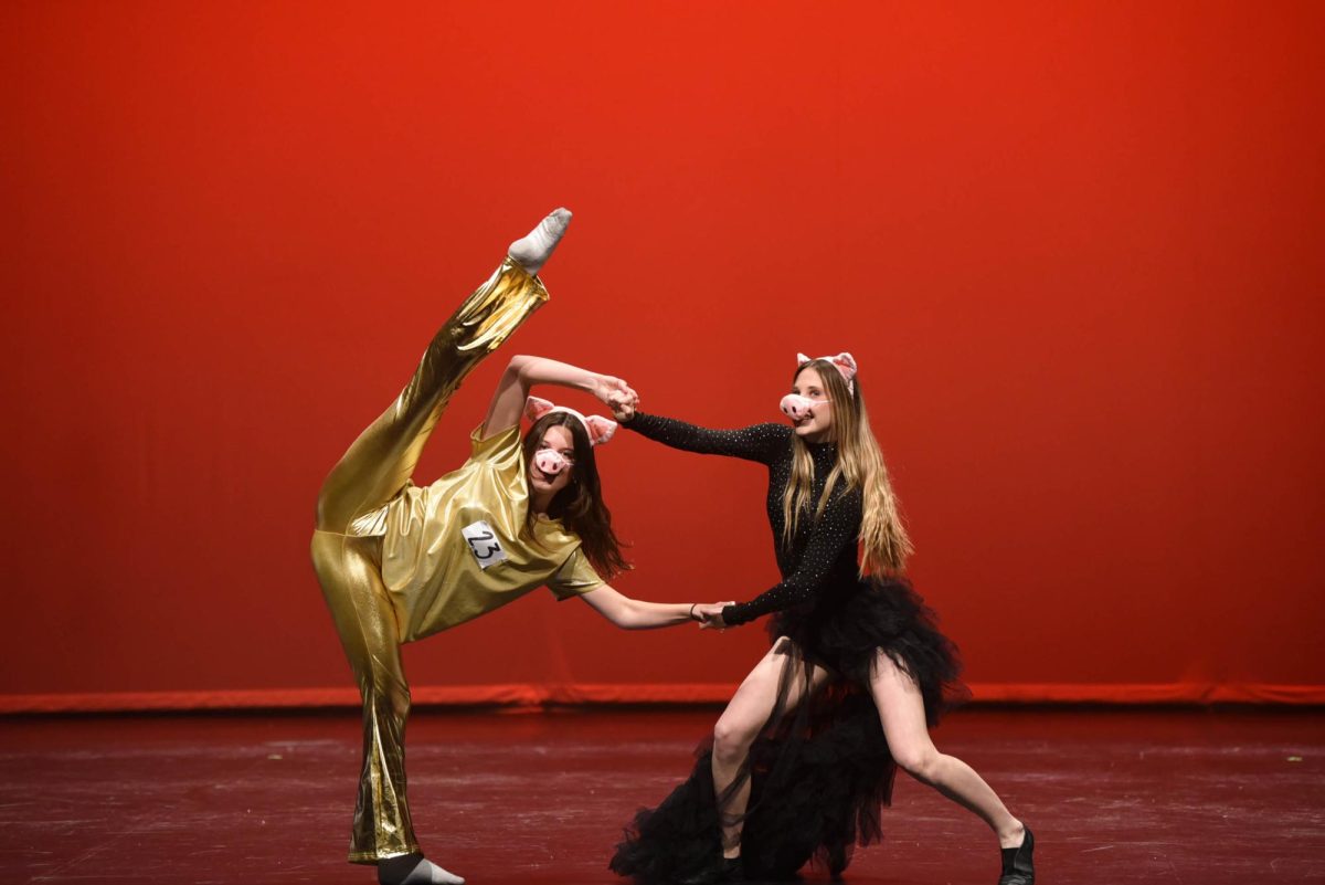 Dancing as the dynamic duo Gunter and Rosita, Brooke Northway (10) and Zoe Pollei (10) captivate the audience in their Sing-inspired jazz number. 