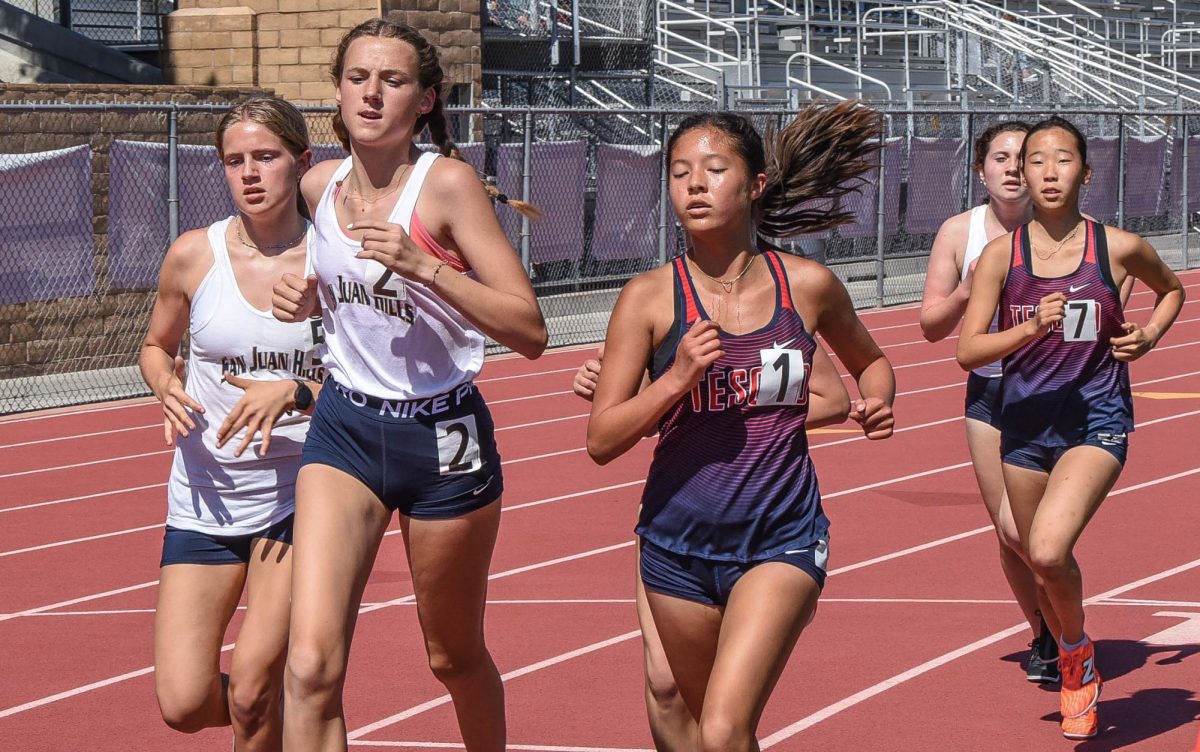 Kira Jensen (9), Danilynn Mathews (9) and Brooklyn Whitacomb (10) running in the long distance race against Tesoro students. After months of training it is finally time for these girls to show the result of all their hard work. In the heat they must test the endurance of their full body in order to successfully cross the finish line.