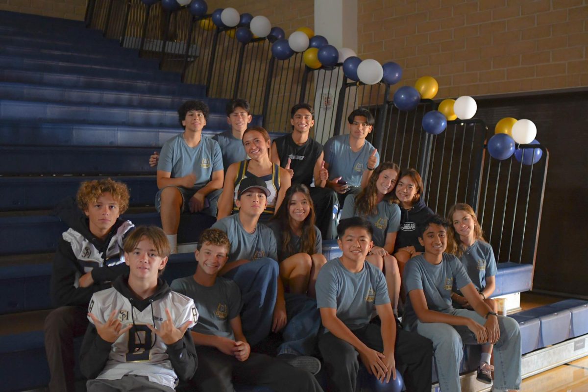 Dressed in their Stallion spirit-wear, varsity cheerleader Peyton Esparza (12) and various ASB members wait for the first pep rally to begin. To kick off the 2024-2025 school year on the right foot, ASB put together a Back to School Pep Rally that took place during the first week of school. 