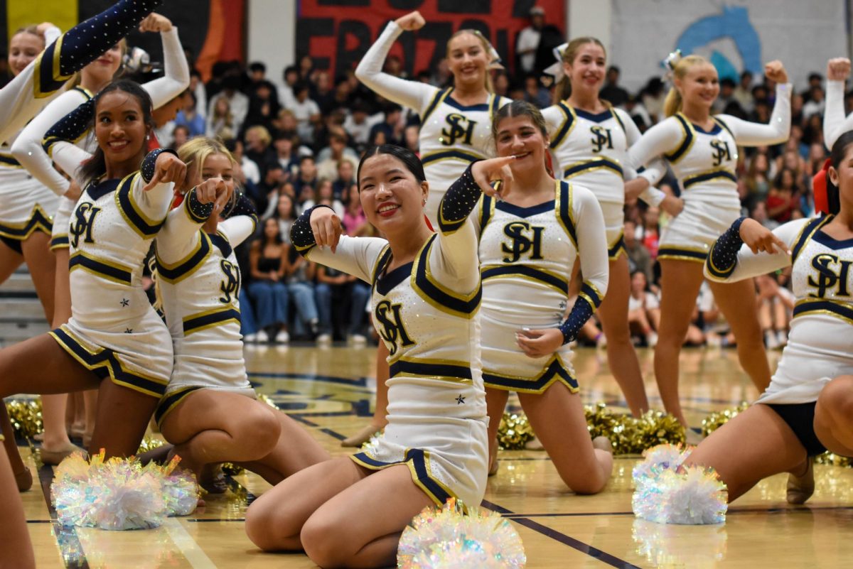 Advanced dancers Ella Smallwood (11), Peach Miller (11), Kayla Tran (12), and Sophia Loftus (11) put on an incredible show for the Homecoming pep rally. 
