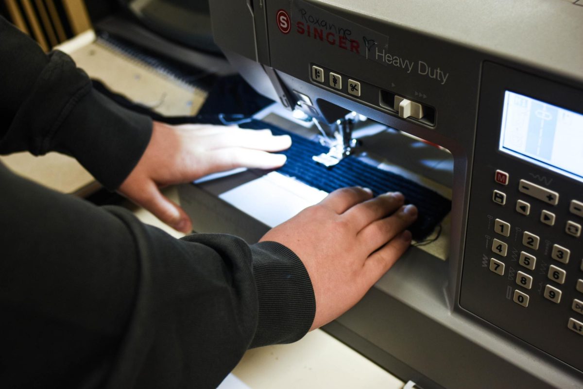 Grace Holley (12) works with a sewing machine, continuing to put together more costumes for the Animal Farm performers. She has been working on this and several other costumes for hours each week, hoping to design the best possible costumes to fit each actor and their assigned character.