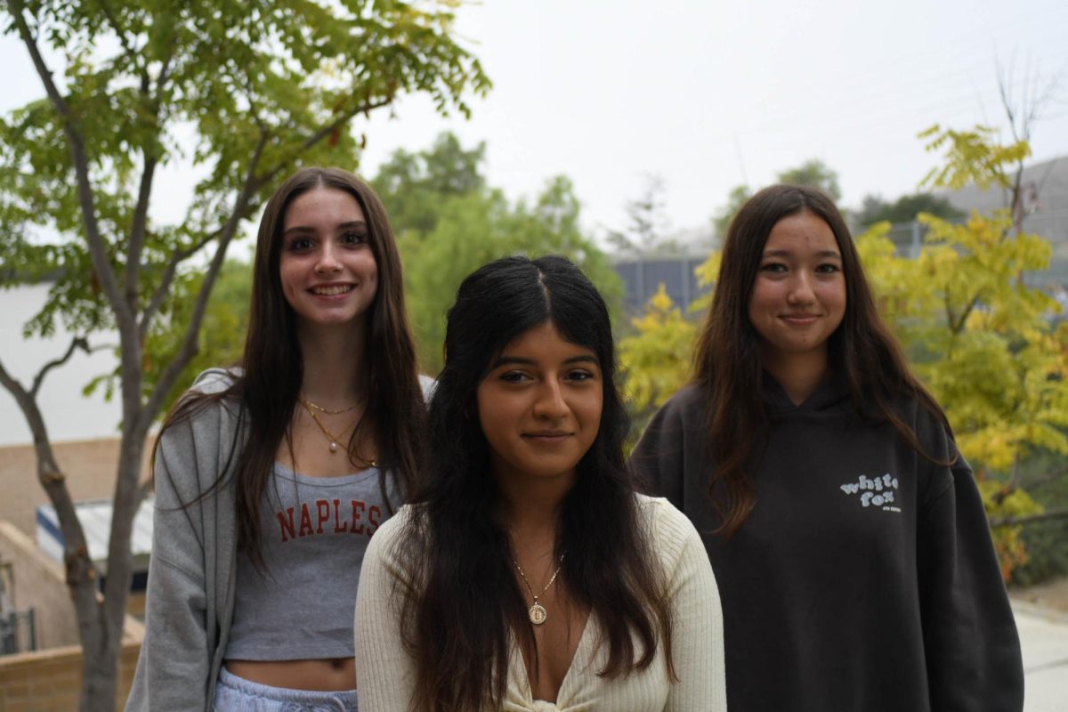 Students all with the name Alexa – Alexa Rodriguez, Alexa Jones, and Alexa Wolf, gather for a portrait outside E14. All of them have experienced strange interactions because of the advent of Amazon’s “Alexa” device. They are not alone. Other SJHHS students with the name are Alexa Delgado, Alexa Smolinki, and Alexa Leitneer. Photo by Cadence Henss  
