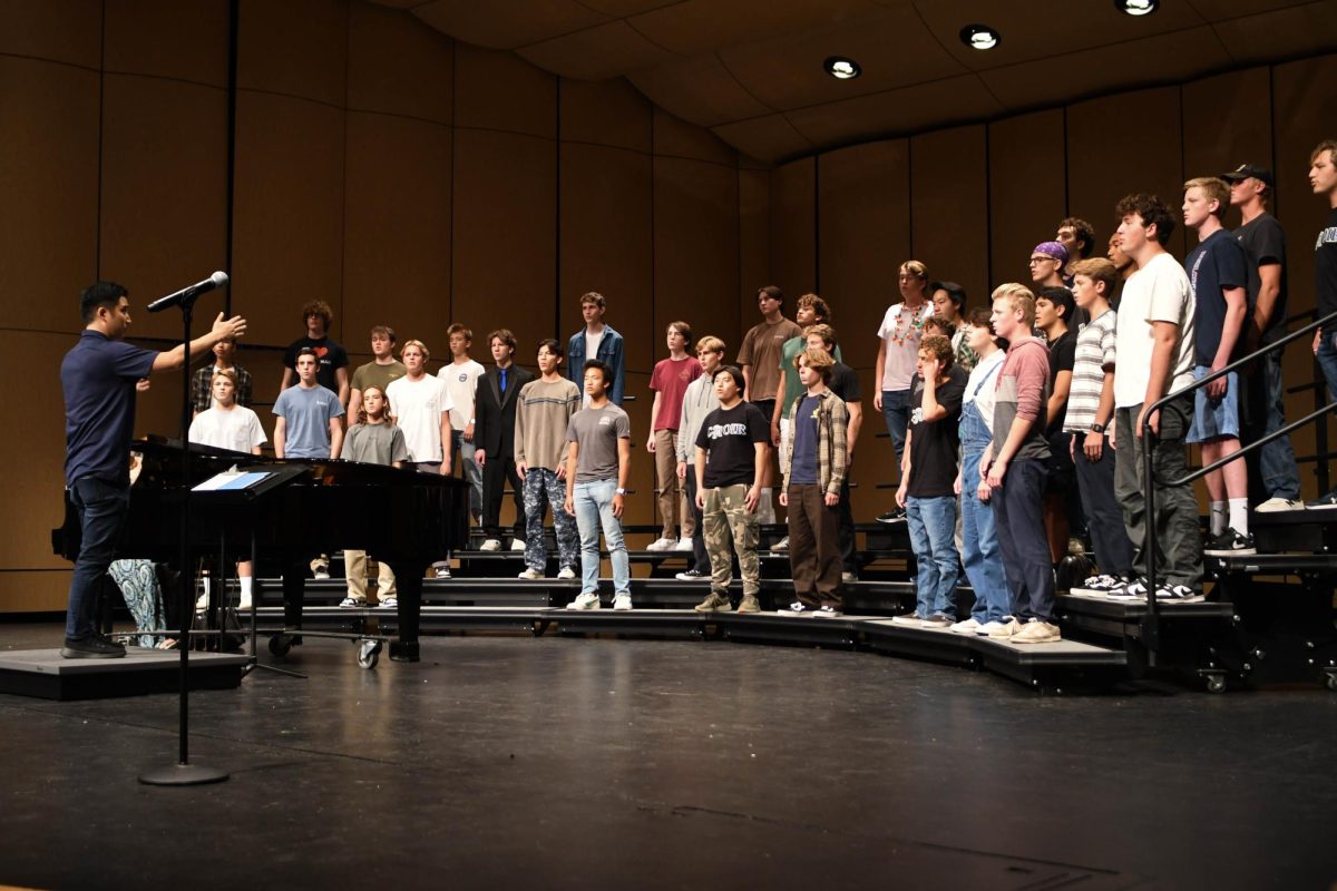 Meistersingers rehearse their fall concert repertoire on Wednesday, October 9th. Choir Director Michael Ushino focused on cleaning up small mistakes to ensure they were well prepared for their concert the next day.