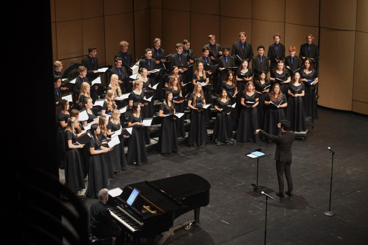 The choir class opens the Performing Arts Fundraiser with a collective performance.This fundraiser was put on in effort to help raise money for the choir, orchestra, and theater department. After choir the theater production as well as orchestra and band put on an ensemble of performances. 