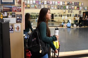 Leaving the dance room after rehearsing various routines, Amelia Mui (12) heads home to complete her school work, which she balances with dance training on a daily basis. “It can be stressful at times but planning ahead for the week and knowing if I have a certain rehearsal on a certain day, I learned to prioritize my time and manage it,” said Mui. 