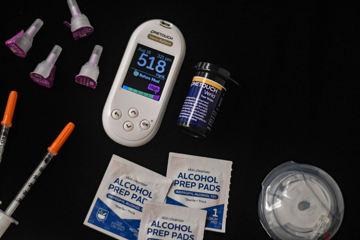 Type one diabetes is not so invisible when it comes to the excessive amount of supplies needed for care. Displayed is a glucose monitor reading 518, just one example showing the difficulty of keeping blood sugar in range below the recommended 250. 
