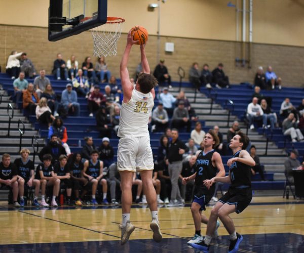 During the first boys varsity basketball game of the 2025 season against Dana Hills on January 13, Mason Hodges jumps to earn two points for his team. The Stallions won 83-58 giving them a great start to the season. Hodges will play a key role in his final season. 