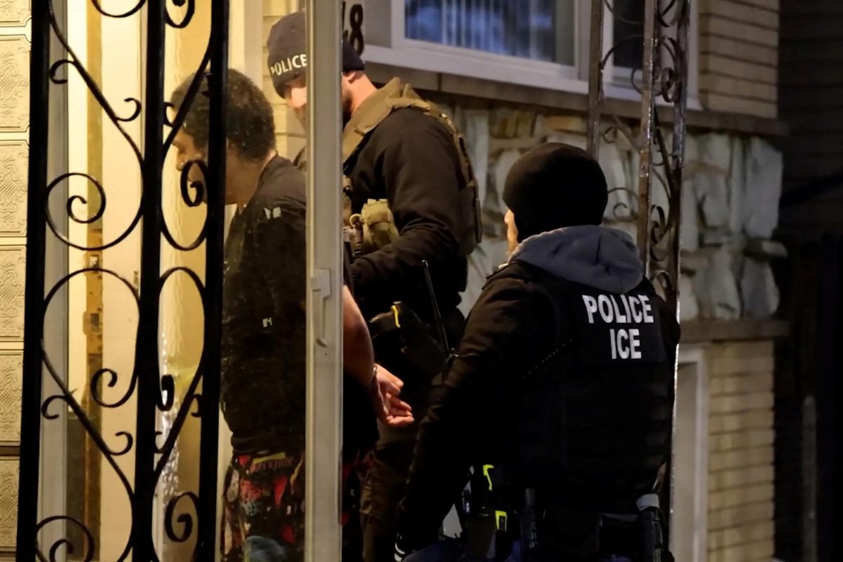 Immigration and Customs Enforcement (ICE) agent making an arrest in Chicago, Illinois, U.S. January 26, 2025 in a still image from video. Trump’s inauguration as the 47th President of the U.S. has led to a slew of new anti-immigration proposals. These policies are not only tearing families apart, but instilling immense fear and uncertainty in various community members. Immigration and Customs Enforcement/Handout via REUTERS