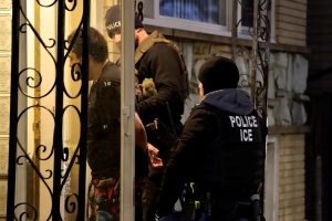 U.S. Immigration and Customs Enforcement (ICE) agents conduct an arrest as part of U.S. President Donald Trump's wide-ranging immigration crackdown in Chicago, Illinois, U.S. January 26, 2025 in a still image from video.  Immigration and Customs Enforcement/Handout via REUTERS