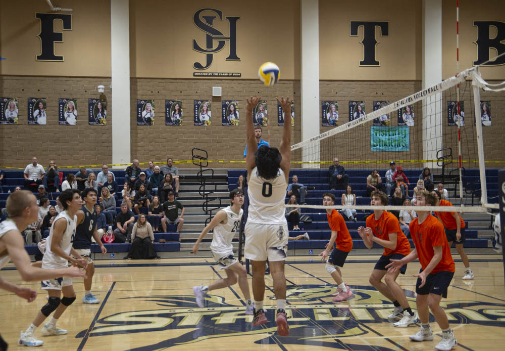 Stallions go up against Pacifica Christian which results in Pacifica Christian winning. Gael Galeana (12) gets ready to spike the ball back to the other team.