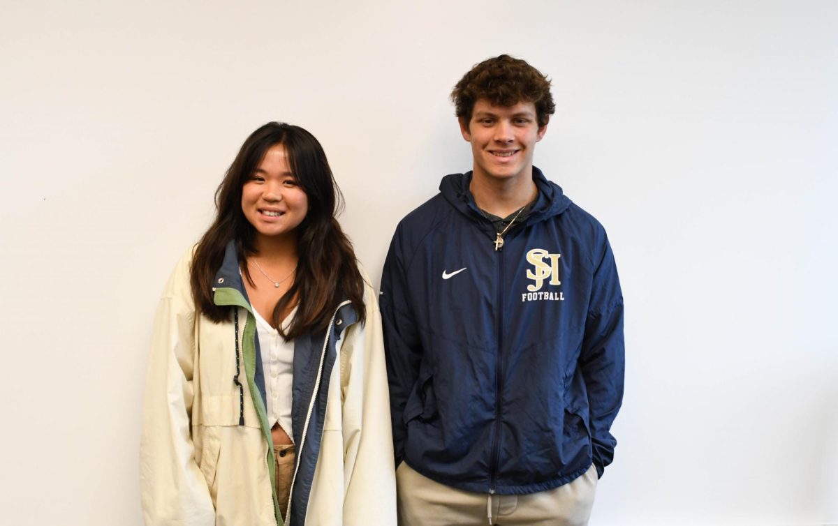 Macy McClellan (12) and Jake Vuoso (12) pose in celebration for winning the annual "Athletes of Character" award. Each year, the Orange County Athletics Directors Association (OCADA) rewards athletes and coaches for their academic performance, leadership, and team-building skills.