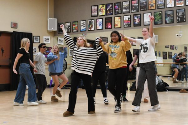 Students Ellie Johnson (10), Letty Rodriguez, and Summer Rice (10) rehearse for the STEPS and dance program performance. The buddies will perform their routine along with other high school dance and STEPS programs on March 7th, at Dana Hills High Schools. 