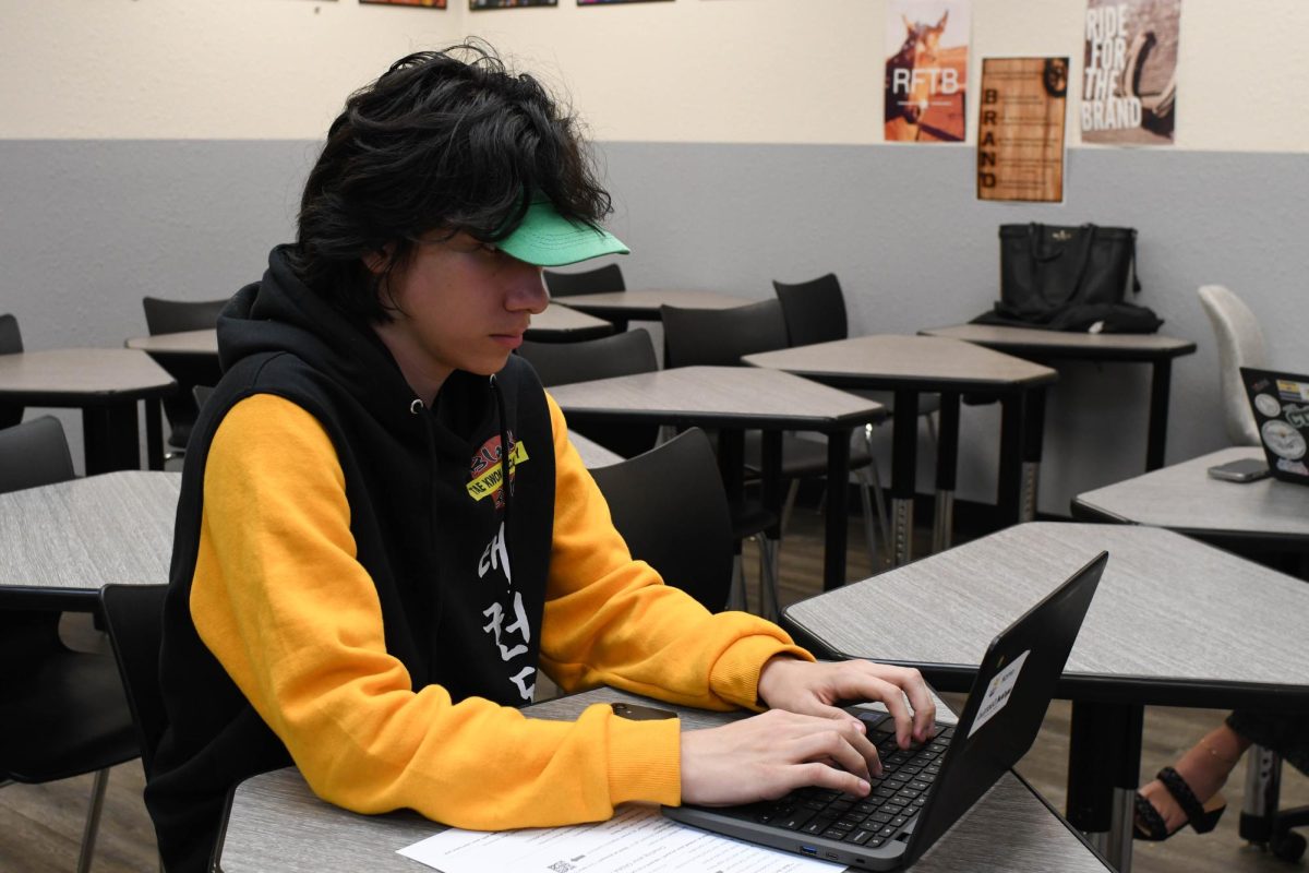 At an afterschool help session, Gustavo Mondragon (12) works through his FAFSA application as deadlines for colleges approach. With the volatility of what may happen with the Department of Education, the futures of many programs like FAFSA are unclear.