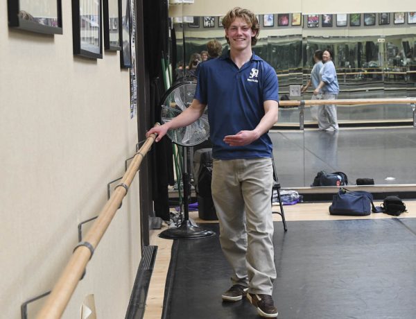 Wrestler and dancer, Nathan Von Urff (11) shows off his dancing skills. Von Urff supports his movement with a ballet bar. 