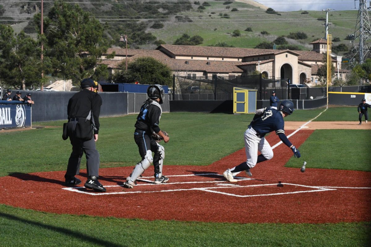 Hudson Doss (11) rushes towards first base. This game against Irvine High School ended with a score of  5 to 3 in favor of the Stallions.
