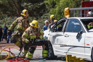 As Hugo Lopez Dina’s (12) character is stuck in the back seat due to a partial paralysis, firefighters act out the use of the ‘Jaws of Life’ to free him from the car. In accidents such as these, survivors may experience a partial or permanent paralysis in parts of their body due to their injuries.