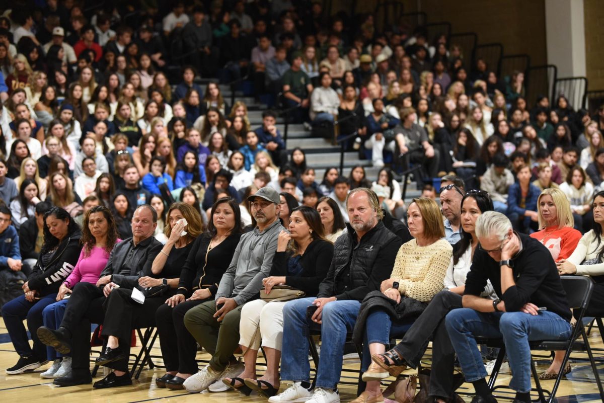 Alongside students, parents of the 'Living Dead' attended the Every 15 Minutes assembly where they watched a recap video of the mock crash, listened to the guest speaker, and exchanged letters with their children. This assembly served as an emotional reminder for these loved ones of the reality of drunk driving.