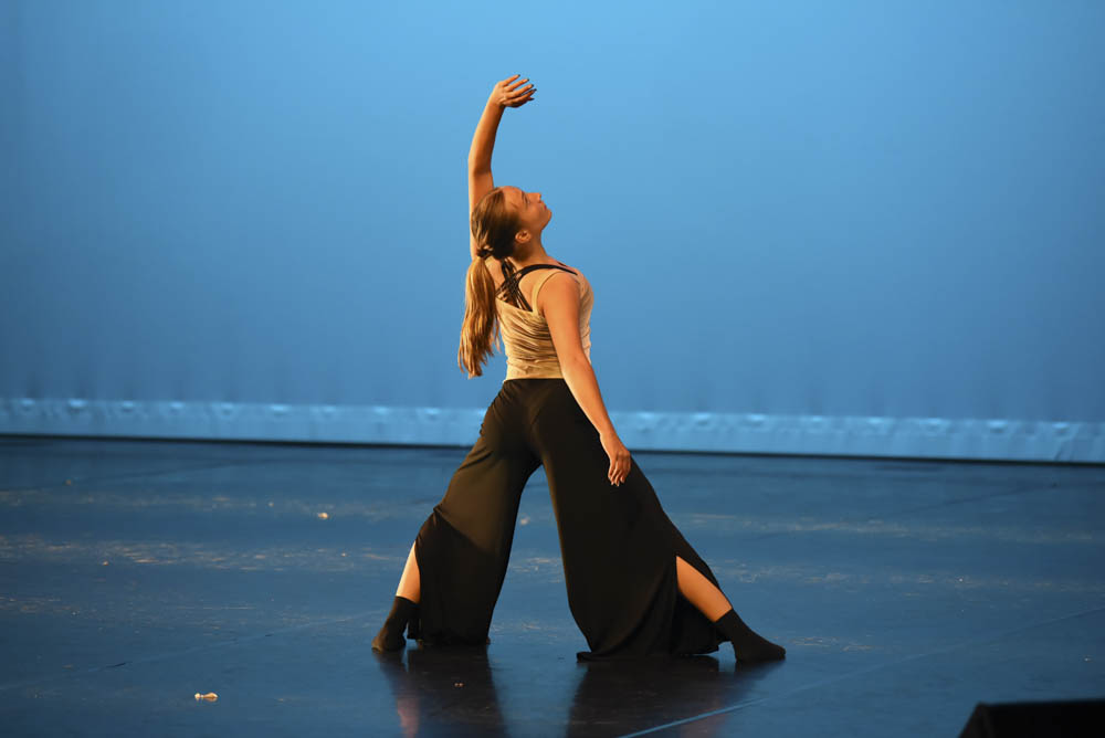 This dance evokes emotion while also consisting of a lot of complex turns and tricks. The gifted dancer, Devynn Smark (11) reaches up as she gets ready to do her next trick. 