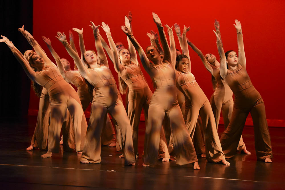 This group dance gives a chilling vibe to the audience as they do a sequence of powerful group poses. Rylee Jump (11), Tatem Altman (9), Elise Malamatenios (12), Ava Alaniz (9) all look and reach up as a group towards the last part of their dance. 