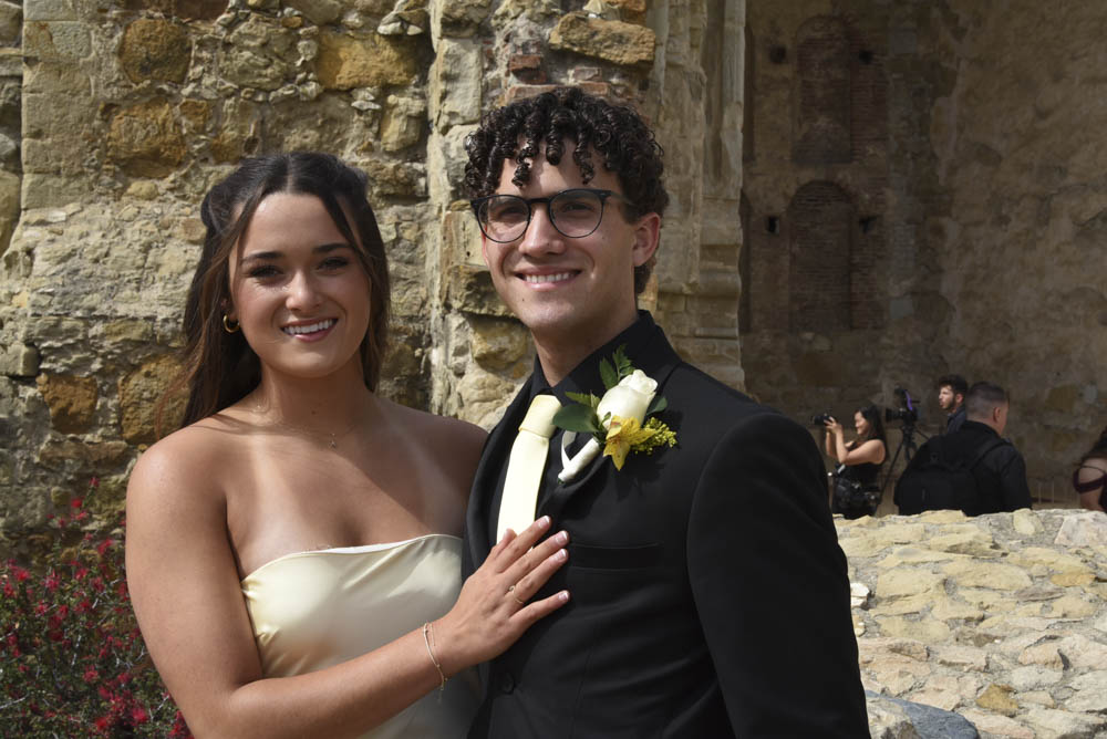  Seniors and juniors gather together at the San Juan Mission to snap some shots for their upcoming prom that night. Aryah Crawford (12) and her date Andrew Siebert pose in front of the mission just before they head off to the prom.