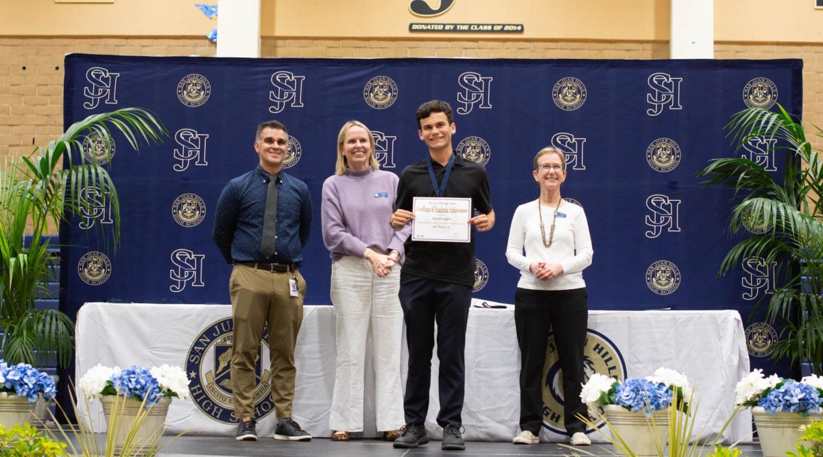 Principal Cina Abedzadeh along with trustees Gila Jones and Lisa Zollinger presented academic awards to students chosen by their respective teachers. Jacob Lapin (11) earned an award in AP physics 2 for achieving excellence in the subject.