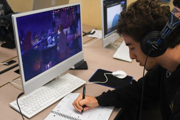 Hayden Montoya (12) listening to famous Youtuber Lofi Girl who live-streams music to study or relax to. Lofi is short for low-fidelity, meaning deliberately unpolished music, often used for background-music.
