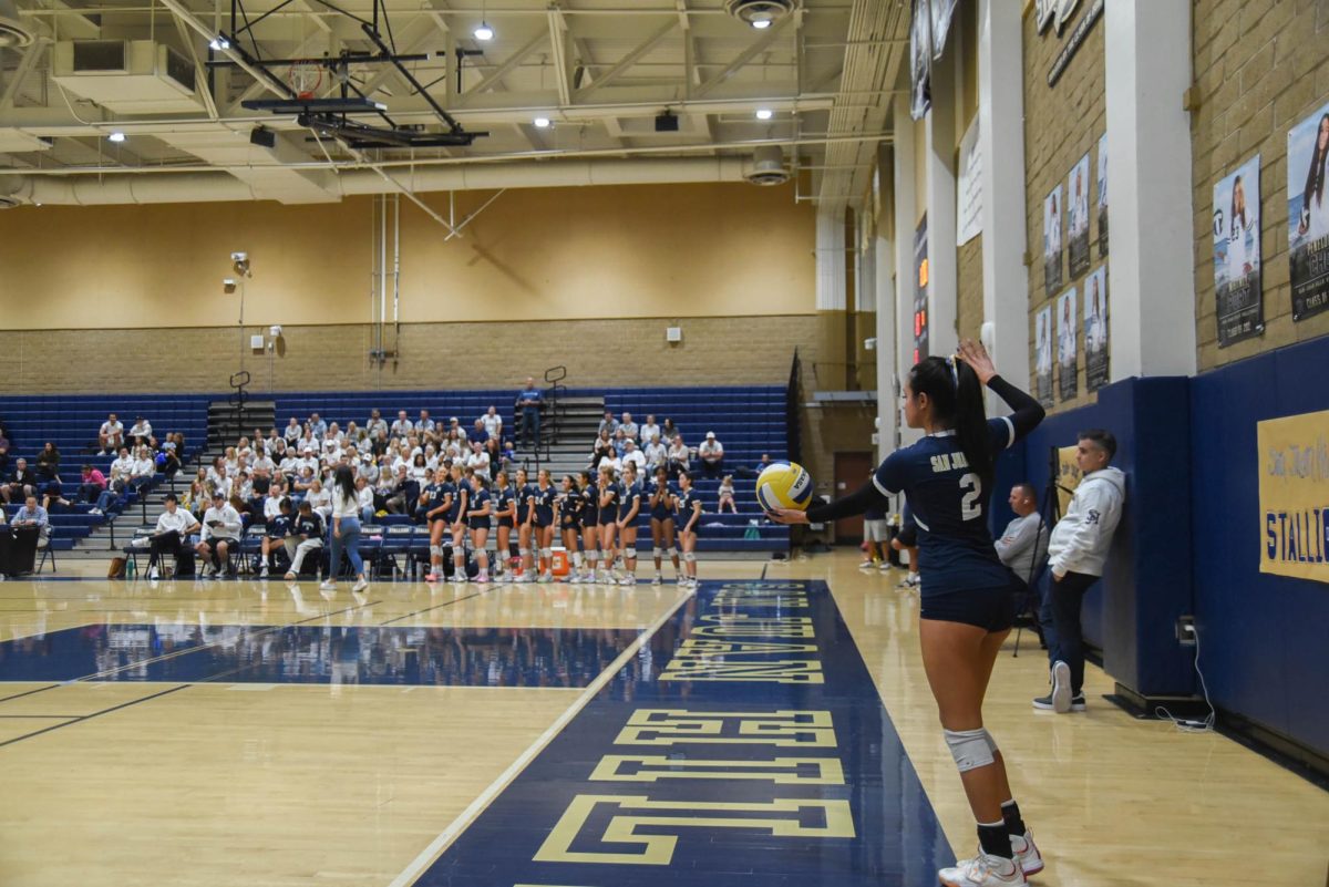 Alexis Link (11) preparing for a jump serve in the Girls Volleyball CIF game against Los Al in Round one. The San Juan Hills volleyball team was able to secure the victory, and move on to round two of CIF.
