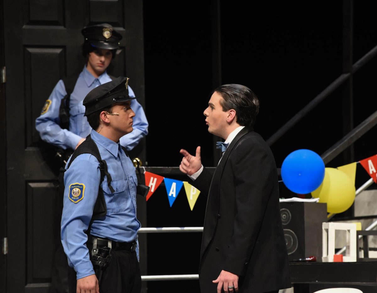 Police show up at the door looking for Lenny to question him about his damaged BMW outside. Officer Welch, played by Ethan Covatta (11), listens as Ken Gorman, portrayed by Camren Motamed (12) as he tries to protect his friend by lying to the officer.