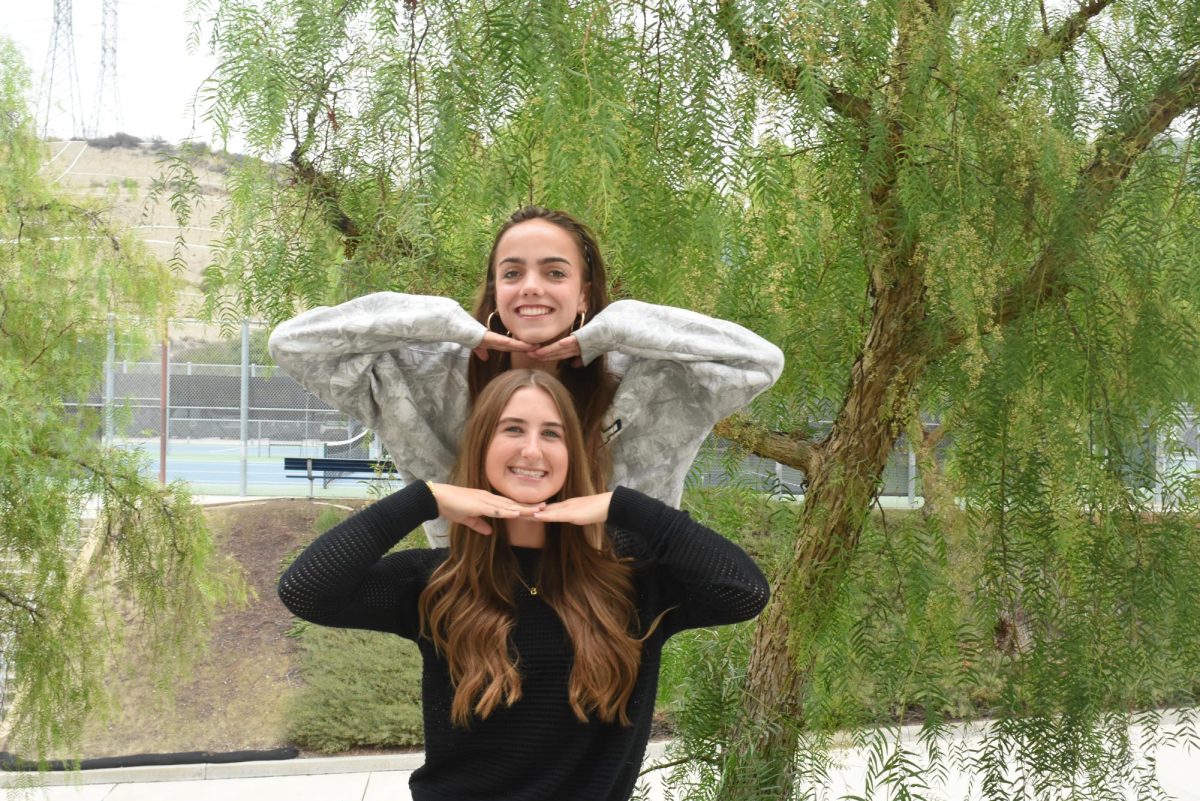 After attending Ohanafest, students Sadie Parsons (12) and Emma Owens (12) express their enthusiasm about the festival. Their smiles reflect their positive experience of the lively music and engaging activities the festival has to offer.