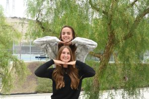 After attending Ohanafest, students Sadie Parsons (12) and Emma Owens (12) express their enthusiasm about the festival. Their smiles reflect their positive experience of the lively music and engaging activities the festival has to offer.