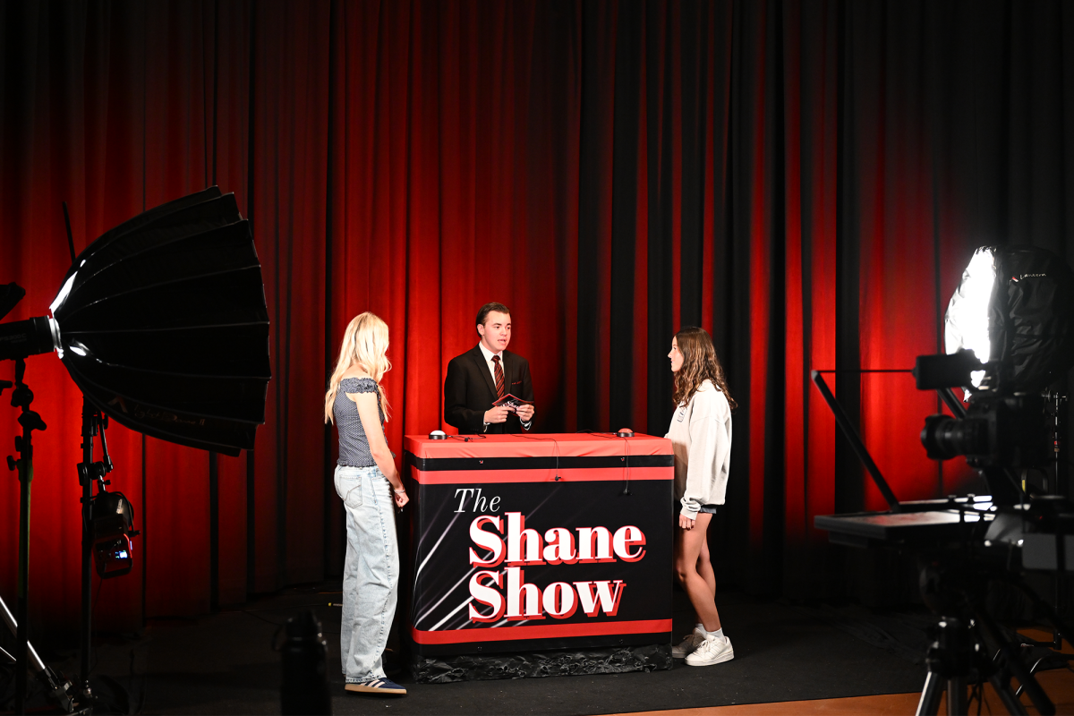 Senior Shane Roberts creates a Shane Show episode with Holland Yerkovich and Sydney Kessler. The show is patterned after an old-fashioned quiz format and invites student leaders from campus in regular episodes. Once Shane graduates the future of the Shane show is unknown.