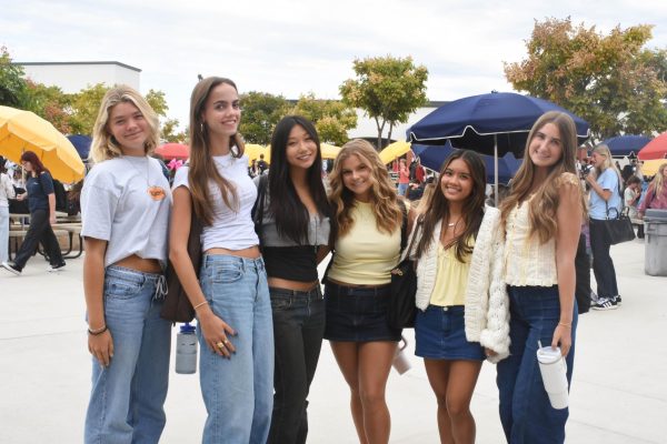 Kristina De Gree, Emma Owens, Brielle Lee, Hailey Palmer, Ava De Ramos, and Sadie Parsons (12) participate in their homecoming spirit week dress up day. The students dress up in colors silver and gold to represent treasure, representing the Pirates of the Caribbean homecoming theme. 
