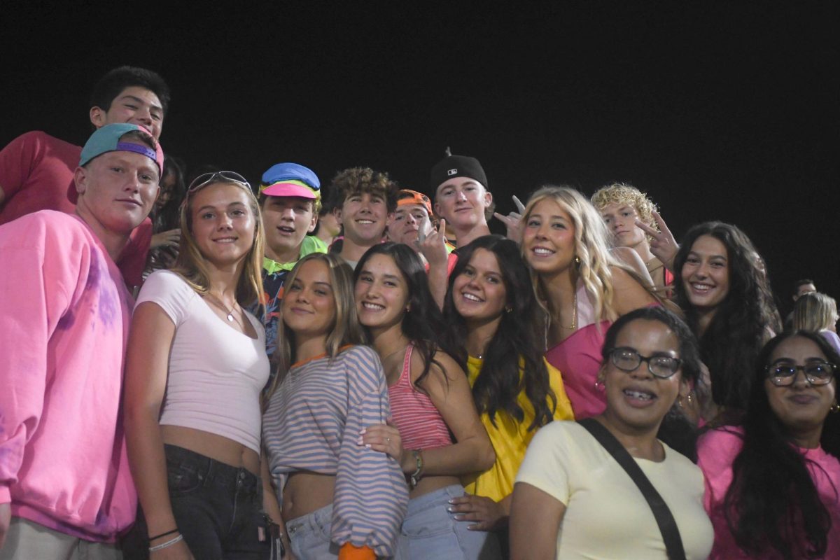 SJHHS students bring the energy to the Battle of the Bell football game, lighting up the night in vibrant neon colors. The Stallions dominated their Titan Rivals 41-7, keeping the bell on stallion turf for another year.
