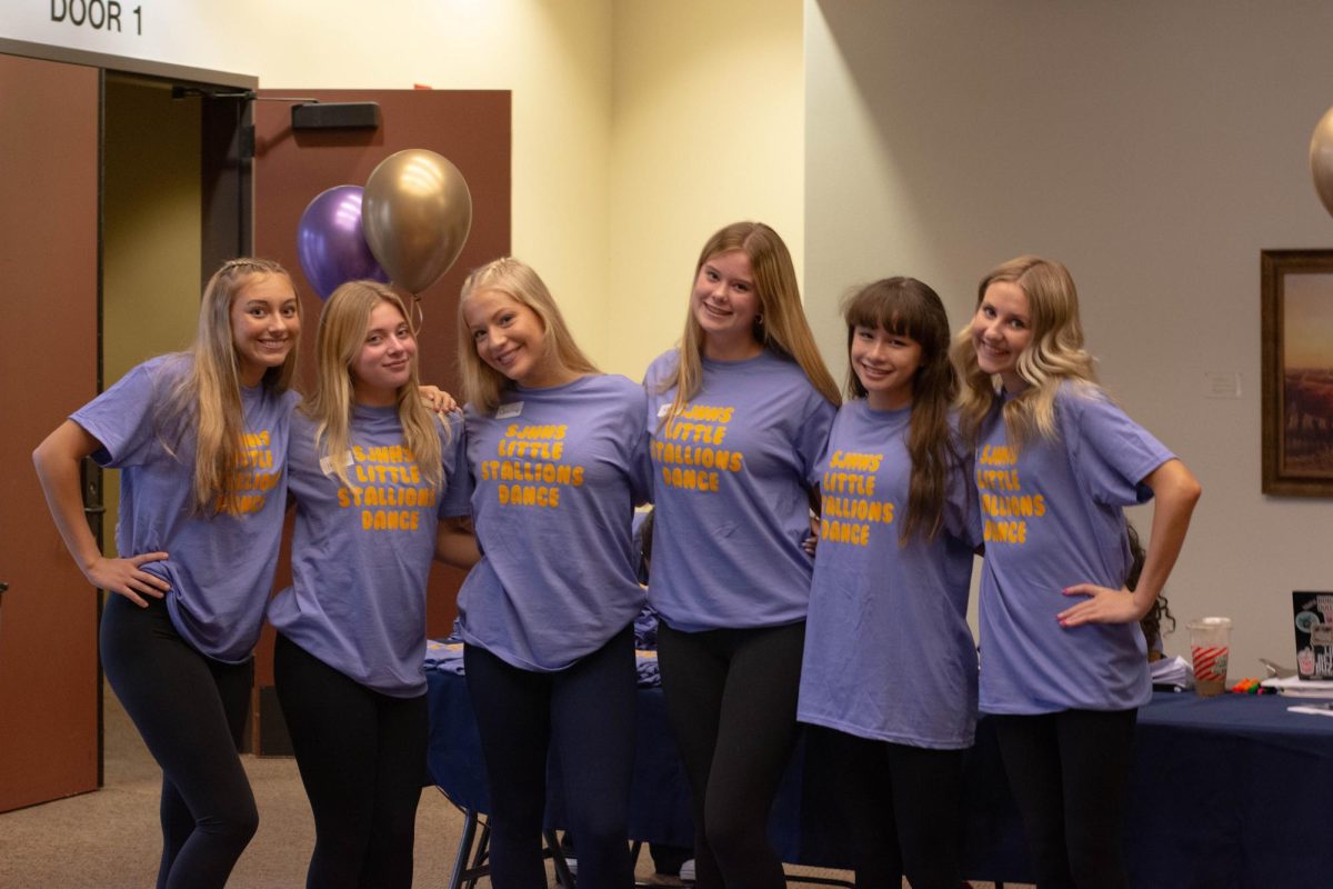 Members and captains of San Juan Hills’ Dance Team prepare to teach future little stallions a self-choreographed dance routine. The theme of the routines is K-Pop Demon Hunters. The captains taught it to the little stallions and will help them perform it on stage at their Fusion Dance Show.