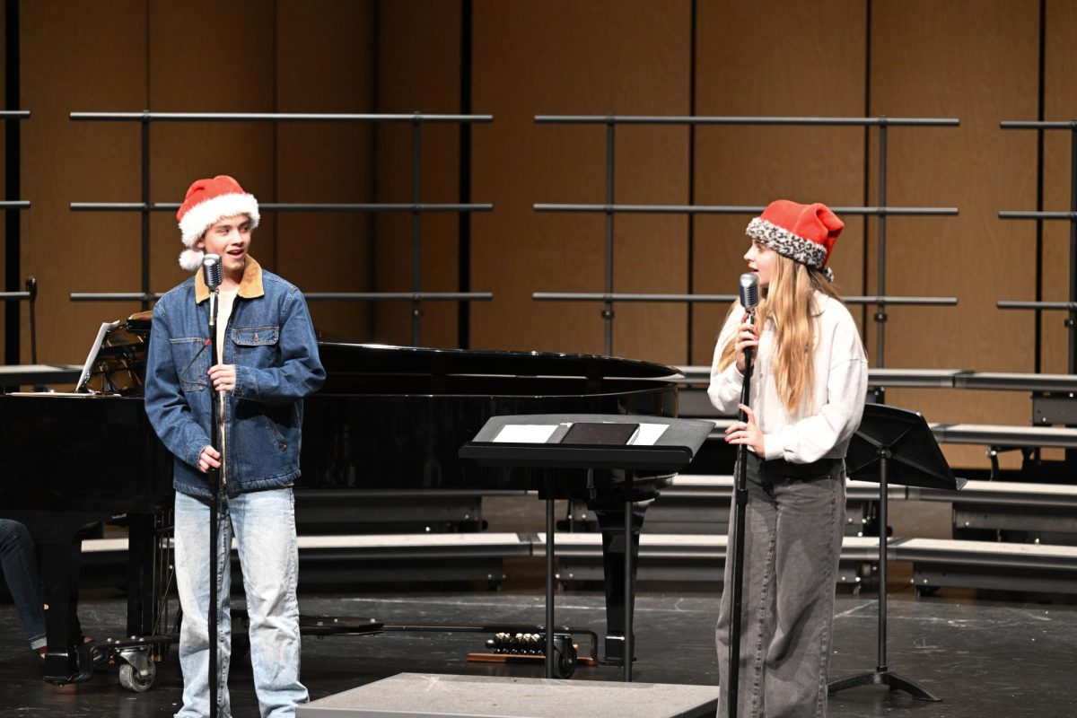 Nash Tanner and Talia Doyle (10) practice a special solo during the dress rehearsal for the 2025 winter choir concert. The pair worked beautifully together to create a wonderful harmony. 
