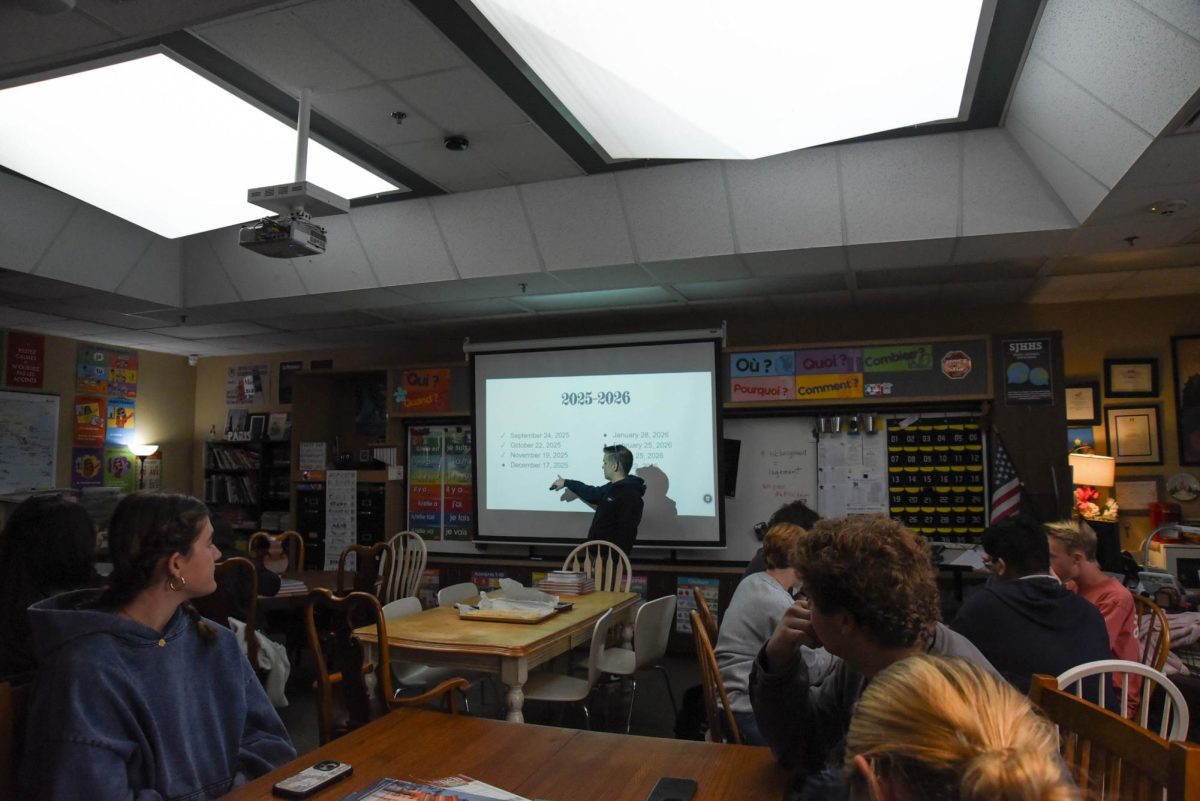 Principal Abedzadeh hosts a student council meeting, giving the students a voice on campus, as he directs the students towards his slideshow of upcoming meetings for the 2025-2026 school year.