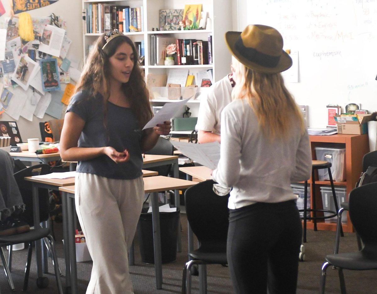 AP Literature students show their knowledge of the reading by acting out the scenes in front of the class. Teacher Christy Bak-Boychuk provides students with various outfits and props, bringing energy and comedy in each performance.