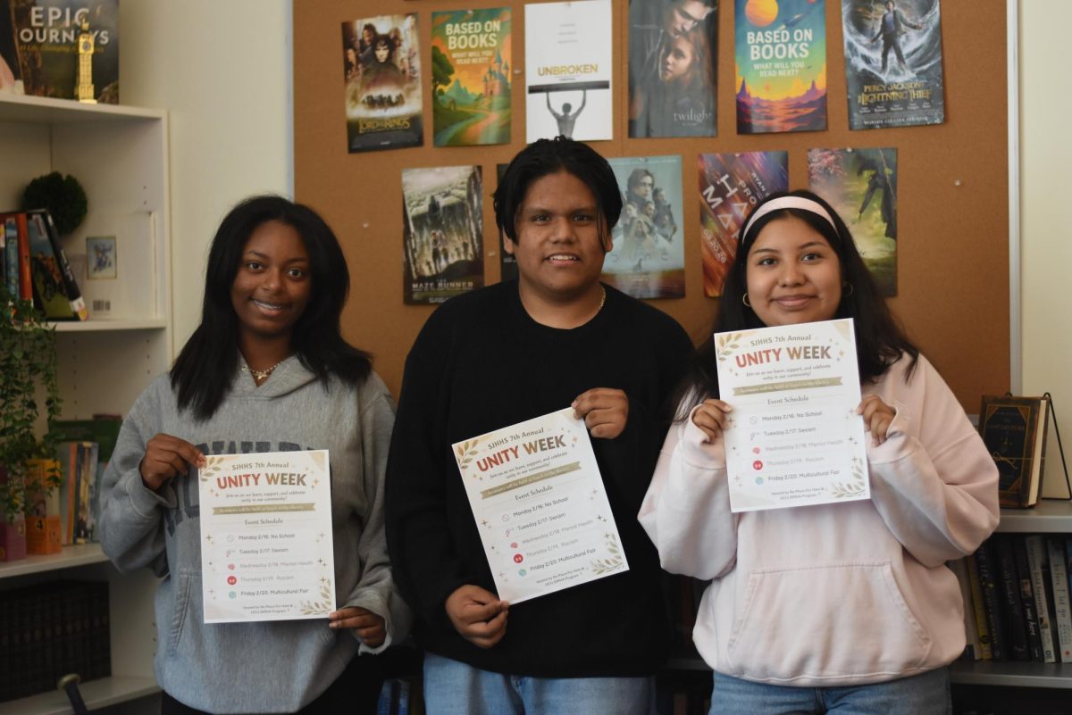 Preparing for Unity Week, presentation leaders Lailah Callier (11), Guadalupe Silva (12), and Jacqueline Castillo (12) hold a meeting to brief students and finish composing their displays. The themes of Unity Week include sexism, mental health, and racism, teaching students to become more well versed and educated. 