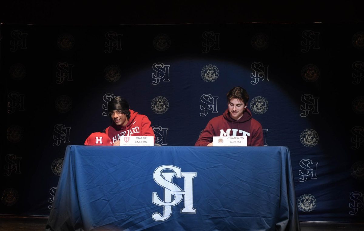 Chase Mason (12) and Cameron Golba (12) sign their forms of intent to continue their athletic and academic careers at two very prestigious schools. After years of hard work, Chase will be playing football for Harvard while Cameron will be playing volleyball for MIT.