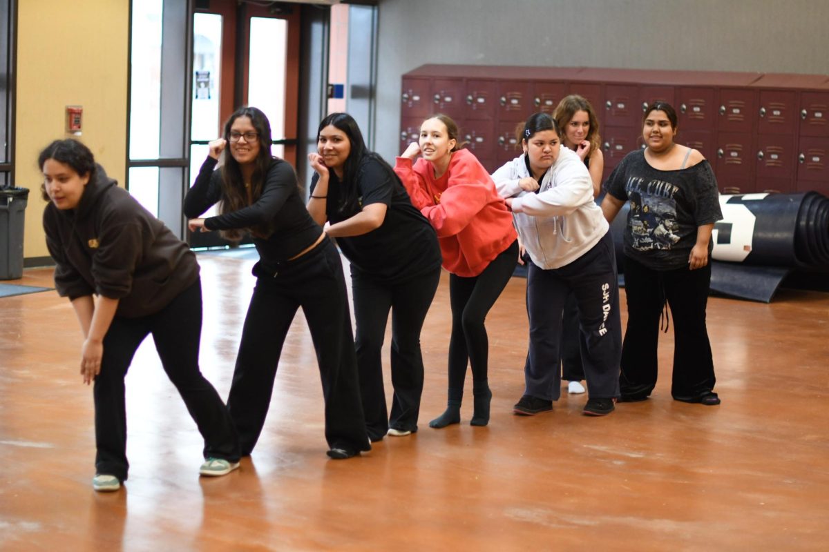 Beginning Dance students practice their routine in the cafeteria. The dance program is currently preparing for their upcoming Student Choreography Show, where they will perform dances they choregraphed. 