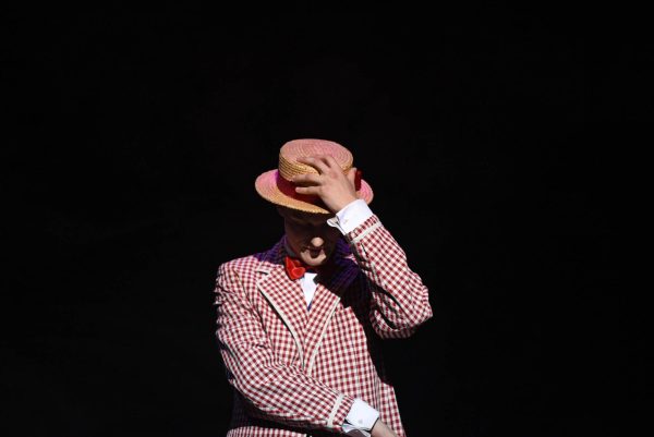 The Music Man, Harold Hill played by Liam Herd (12) looks down and tips his hat as the scene ends. The townspeople become increasingly suspicious about Hill’s intentions, causing him to become more and more cautious.